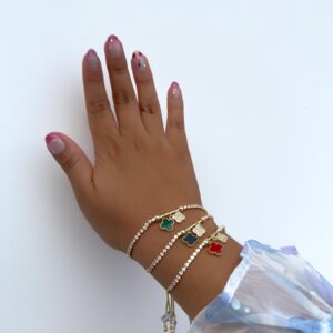 PULSERA EN RODIO CON TREBOLES Y CIRCONITAS